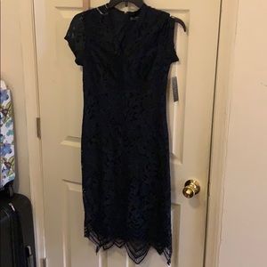 Short navy dress—never worn with tags